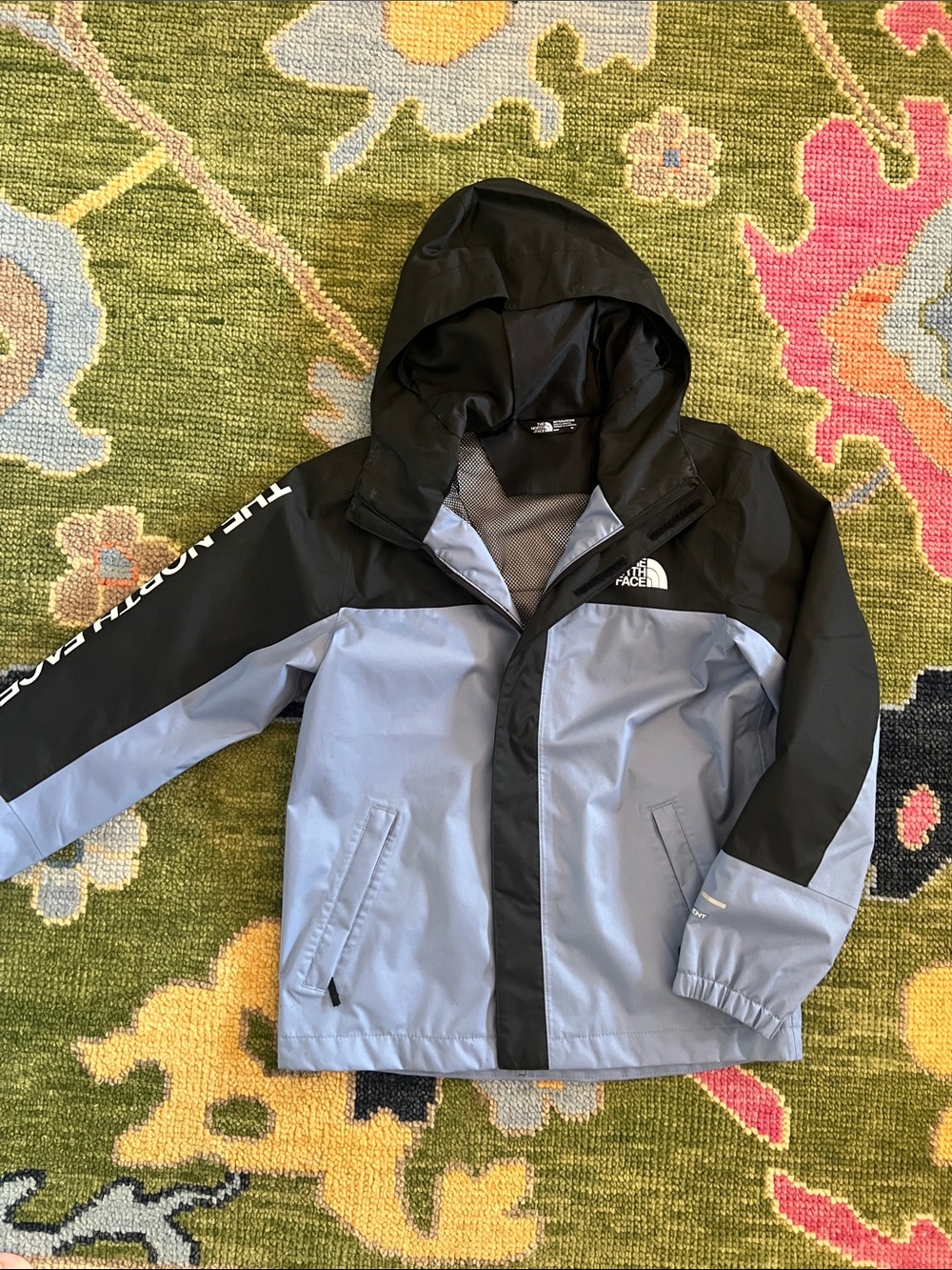 The North Face Light Blue and Black Kids' Hooded Rain Jacket